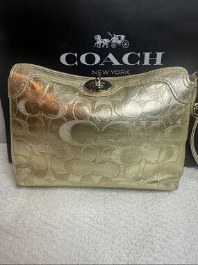 Coach Gold Metallic Signature Wristlet Clutch